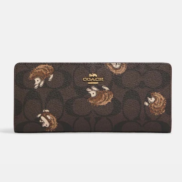 Coach Slim Wallet In Signature Canvas With Hedgehog Print
Gold/Brown Black Multi - Picture 2 of 16